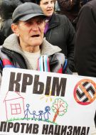 A man holding a plackard