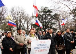 A man holding a plackard