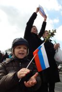 Boy holding a flag of Russia