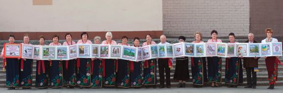 Presentation of embroidered book based on the works of Shevchenko