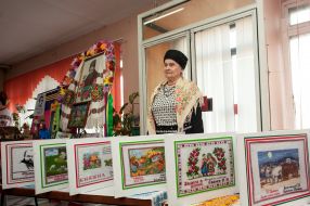 Presentation of embroidered book based on the works of Shevchenko