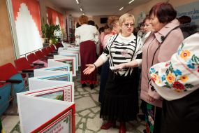 Presentation of embroidered book based on the works of Shevchenko