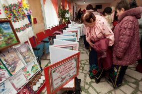 Presentation of embroidered book based on the works of Shevchenko