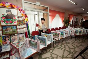 Presentation of embroidered book based on the works of Shevchenko