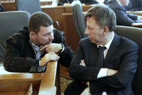 Vladimir Makeyenko and Evgeniy Heller