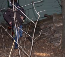 Law enforcement officials inspect the place