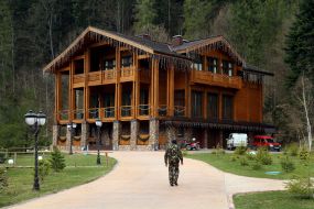 A guard comes to the house for guests