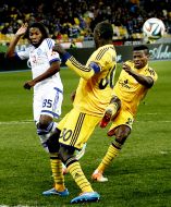 Papa Gueye, Dieudonne Dieumerci Mbokani and  Ayila Atanda Yussuf