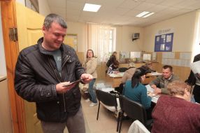 A man holds a Russian passport