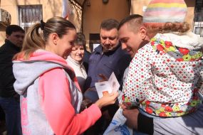 A woman holds a Russian passport