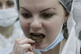 Girl eating hamburger