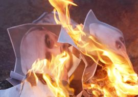 Burning Putin's portrait