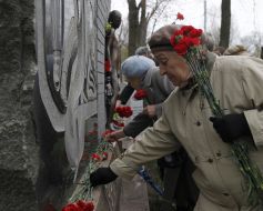 Participants of ceremony of laying-on of flowers