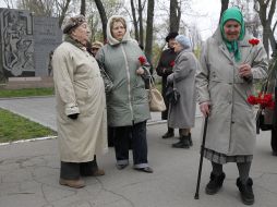 Participants of ceremony of laying-on of flowers