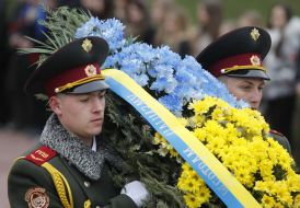 Participants of ceremony of laying-on of flowers