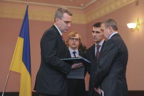 Jeffrey Payyett, Vitaly Yarema and Andrey Deshchitsa