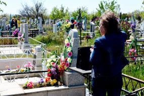Woman near the grave