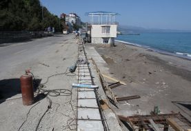 Woman sitting on the beach