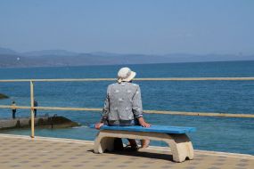 Woman sitting on the beach