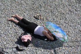 Woman relaxing on the beach