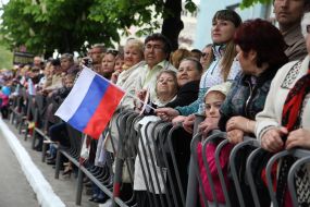Participants of festive demonstration