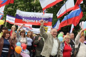 Participants of festive demonstration
