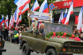 Participants of festive demonstration