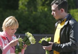 The guy buys lilies of the valley
