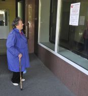 Woman reading a listing