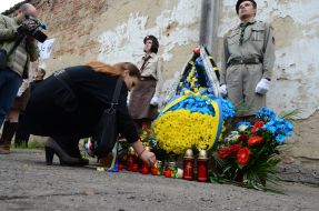 Girl puts a lighted icon lamp