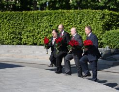 Participants of ceremony of laying-on of flowers