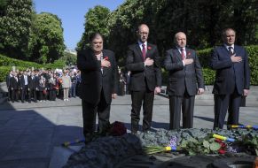 Participants of ceremony of laying-on of flowers