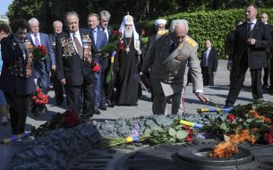 Participants of ceremony of laying-on of flowers