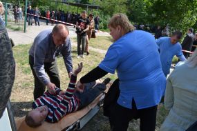 Doctors carry a man on stretcher