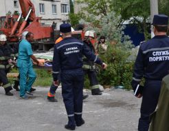 Evacuation of woman from brought down home