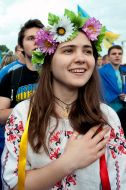 participants  of parade Ukrainian flags