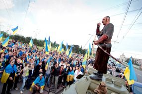 participants  of parade Ukrainian flags