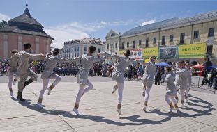 Children perform a dance