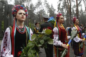 Participants of the ceremony of laying flowers
