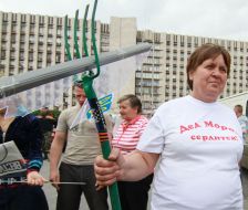 Woman breaks the ballot box