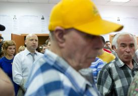 Alexksndr Turchynov with a wife on an election district