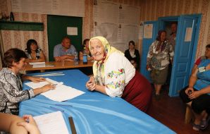 Elderly woman on an election district