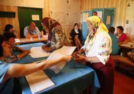 Elderly woman on an election district