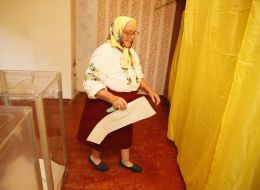 Elderly woman on an election district