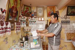 The man votes in the house