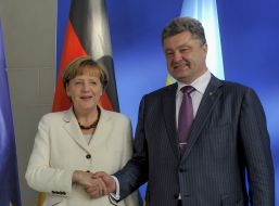 Petr Poroshenko and Angela Merkel