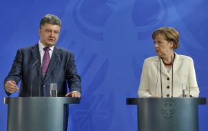 Petr Poroshenko and Angela Merkel