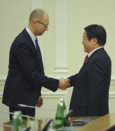 Arseny Yatsenyuk and Cai Wu