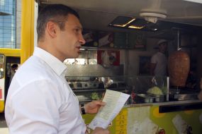 Vitali Klitschko near shopping stall