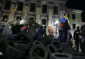 Protesters overturned car